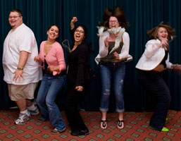 The communication students who attended the TIPA conference in Dallas jump with glee after the awards banquet.