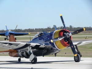 A P-47 owned by the Lone Star Flight Museum is painted to resemble an aircraft of the 358th Fighter Group from 1944.