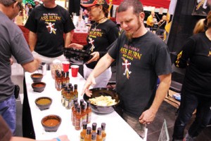 Trevi Biles, big daddy of Big Daddy's Hot Sauce, showcases his wares at Guy Expo.