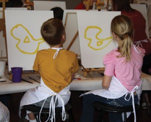 Landon and Kylee Kelly begin their chicken paintings. Photo by Theresa Greenshields: The Signal.