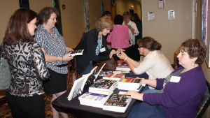 RWA members register for the annual Lone Star Writer's Conference at the check-in table.
