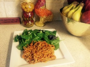 Image: Whole grain spaghetti pasta with organic tomato sauce and spring mix salad. Photo by The Signal blogger Bianca Salinas.