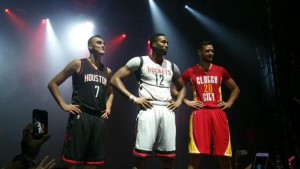 image: Pictured L-R: Sam Dekker, Dwight Howard and Donatas Motiejunas stand and model the Houston Rockets' three new alternate jerseys. Photo courtesy of @00rocketgirl on Twitter.