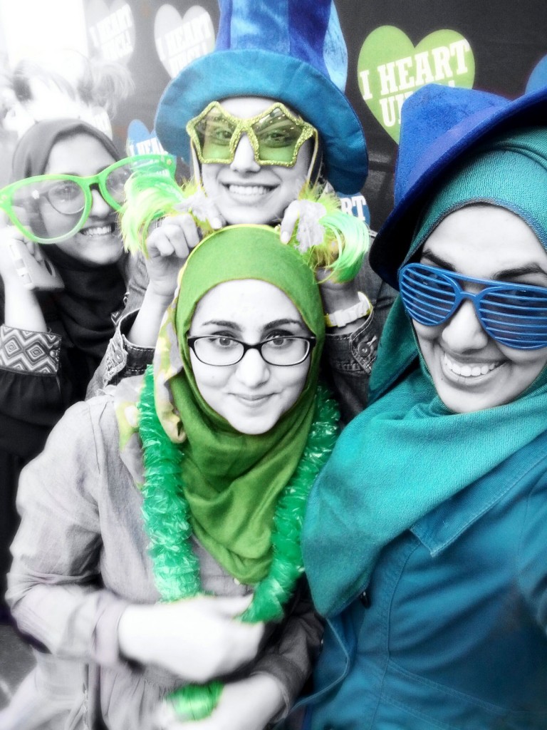 Image: Photo of Wardah Ajaz and her friends showing off their UHCL pride for Spirit Week 2015. The photo was submitted as part of a photo contest The Signal held during Spirit Week.