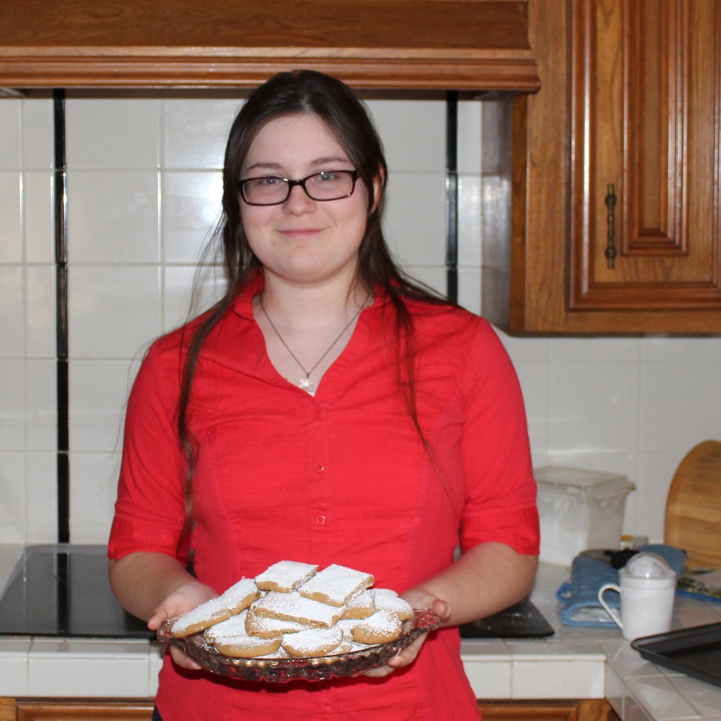 PHOTO: Erika Brady, ____, holding Swedish butter cookies. Photo by The Signal reporter Cindy Brady. 