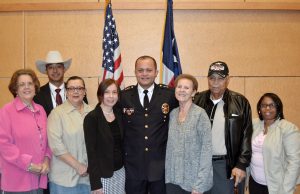 Photo: Hill, center, was joined by his family (from left) his aunts, Mary Knox and Francine Sparrow; his cousin, Texas Ranger James Wilkins; his wife, Eva Lanczos Hill; his parents, Clarence and Edna Hill and his sister, Catherine Hill. Photo courtesy of Jim Townsend.