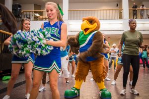 The UHCL Spirit Squad accompanied by Henry the Hawk mascot dance and rally fellow students during Spirit Week.