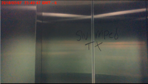 Graffiti in Bayou Building's men's restroom displaying the word, "nine." Photo courtesy of UHCL PD.