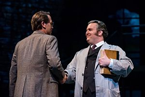 Jeremy Webb as Watson (left) and Bruce Warren (right) as Dr. Evans in the Alley Theatre’s production of "HOLMES AND WATSON." Photo Courtesy of Chris Diaz, Alley Theatre.