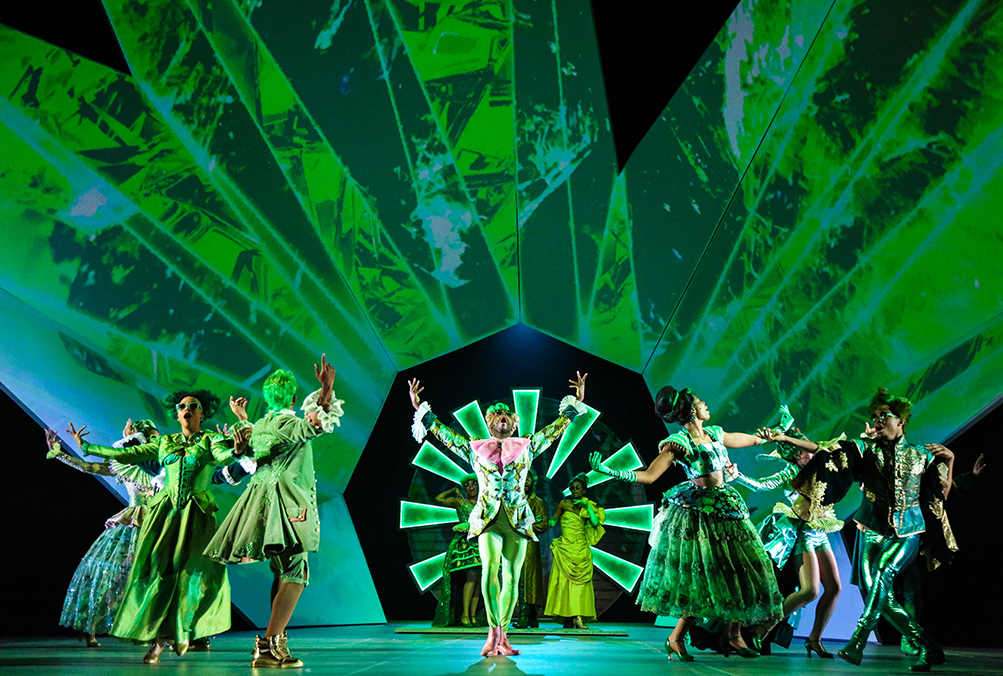 PHOTO: "The Emerald City Dance" was one of the most memorable scenes from the entire production even though it featured little to no story elements. The ensemble's clothes reflect the high society that is Emerald City. Photo courtesy of Melissa Taylor and TUTS.