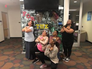 PHOTO: BSA members pose in the well known Wakanda Forever pose in celebration of the turnout for the event. Photo courtesy of Aliya Beavers.