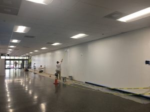 The main entrance hallway at the Bayou Building being painted. Photo by: Taleen Washington