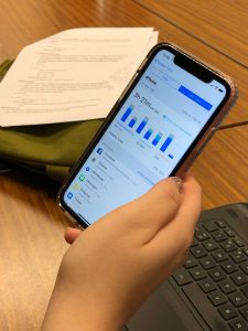 PHOTO: UHCL Student Shelby Schillings using the "Screen Time" feature on an Apple iPhone. Photo by The Signal assistant editor Miles Shellshear