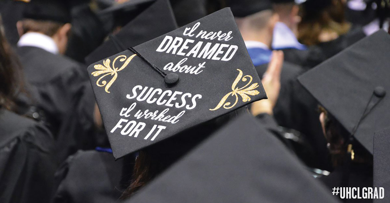 PHOTO: Student wearing a black graduation cap with the words "I never dreamed about success I worked for it" in silver with gold accents on the edges. Photo courtesy of UHCL Marketing and Communications.