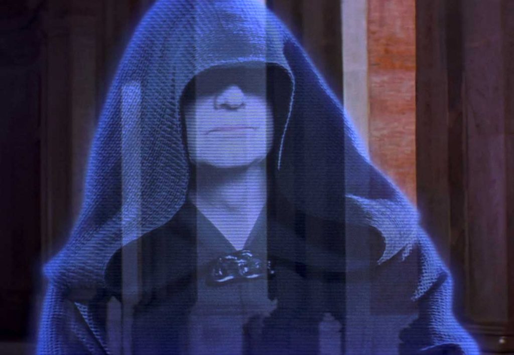 PHOTO: Image from Star Wars Episode I: The Phantom Menace, depicting a cloaked old man, who is Darth Sidious. Photo courtesy of Lucasfilm and 20th Century Fox.